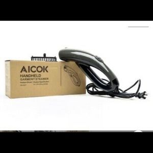 Handheld garment steamer